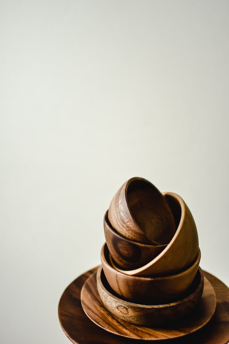 Stack Of Wooden Plates And Bowls