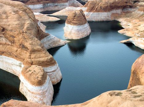A breathtaking aerial view showcasing the unique rock formations and water channels in Glen Canyon.