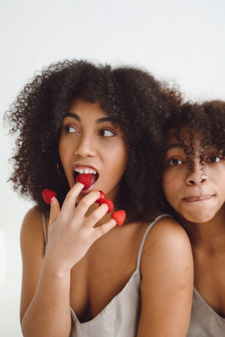 Woman Eating Fresh Strawberries