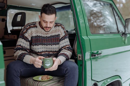 A Smiling Young Woman in a Campervan · Free Stock Photo