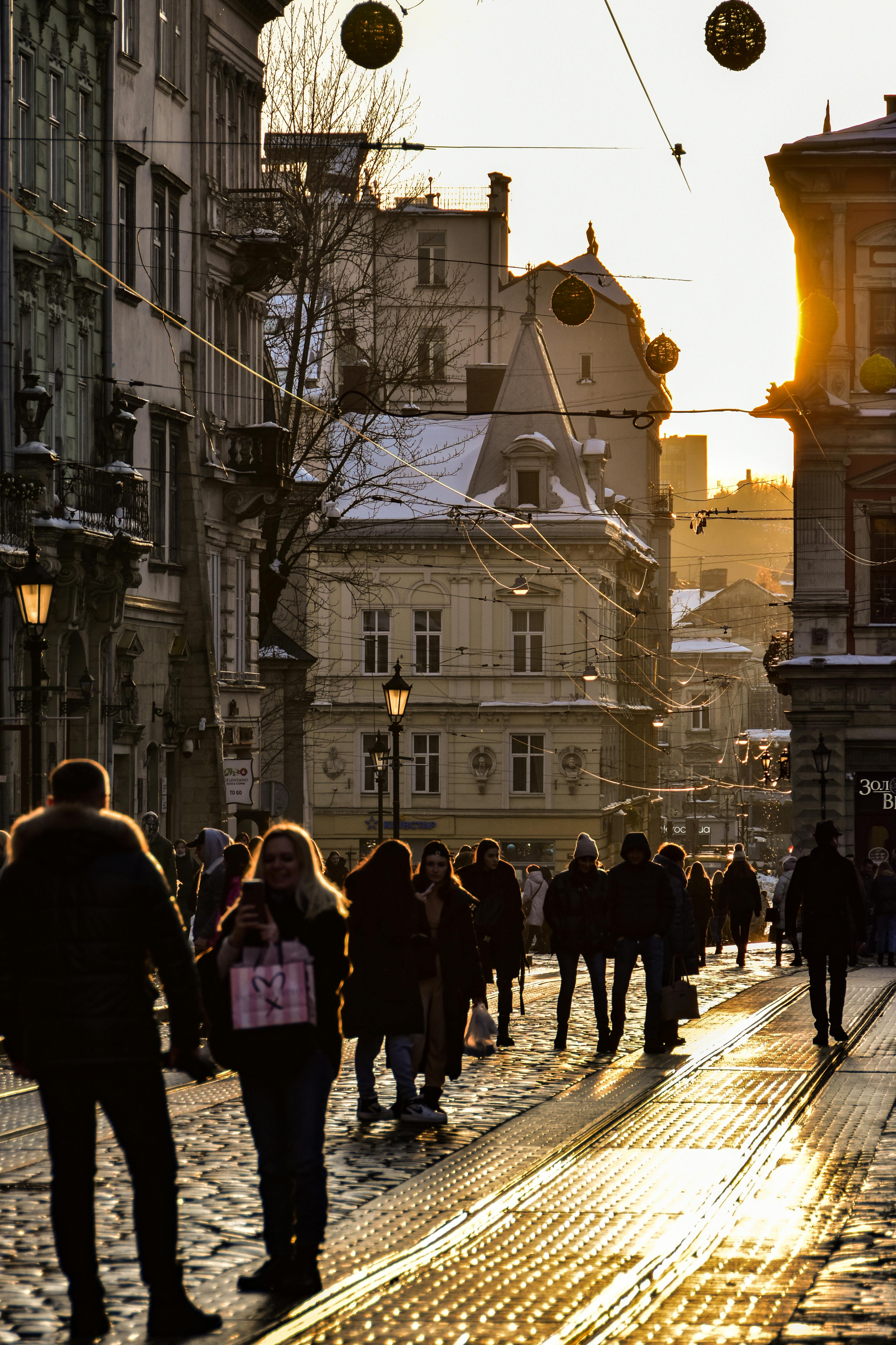 Cobblestone Street in Old Town with Towers behind Buildings · Free Stock  Photo