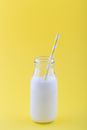 Milk in Clear Glass Jar With Straw