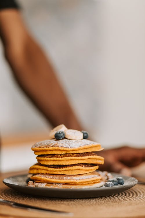 Free Stack of Delicious Pancakes on a Plate Stock Photo