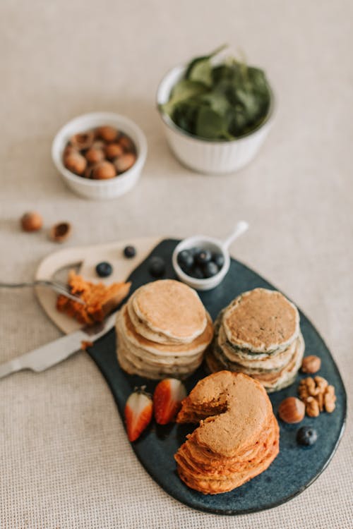 Free Stacks of Pancakes Near Fruits Stock Photo