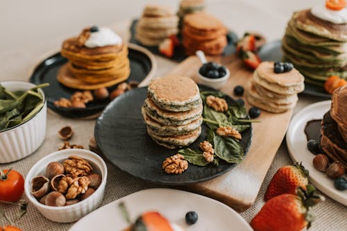 Free Flavored Pancakes on Ceramic Plates Stock Photo