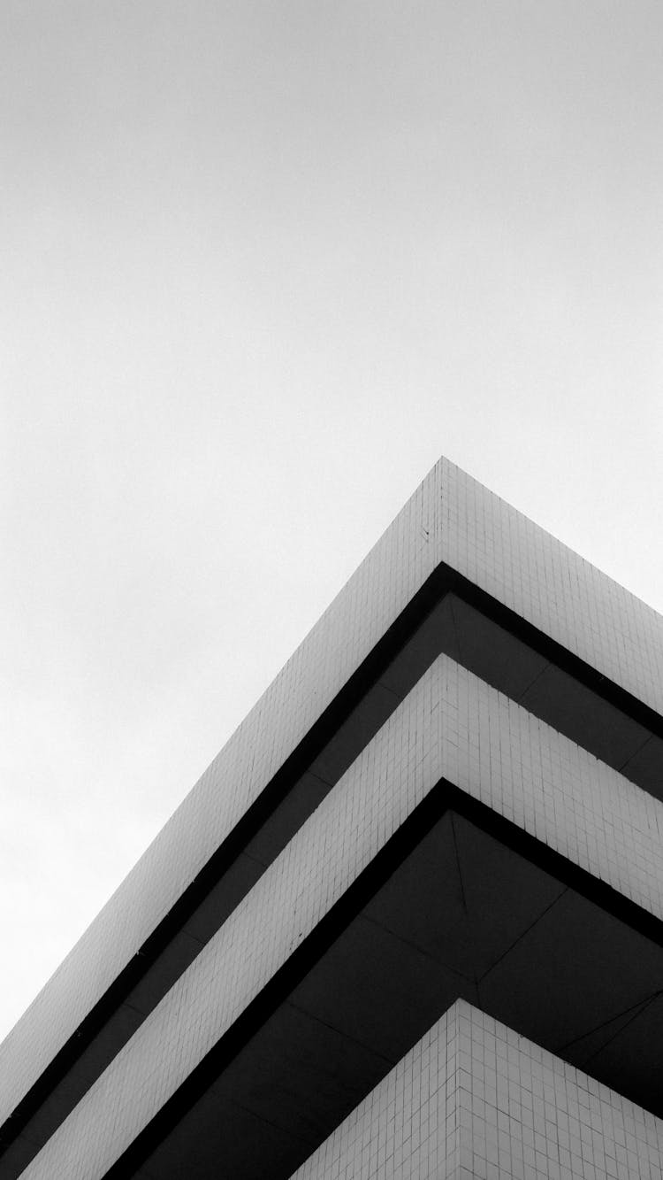 Modern Geometric Building Roof Against Sky