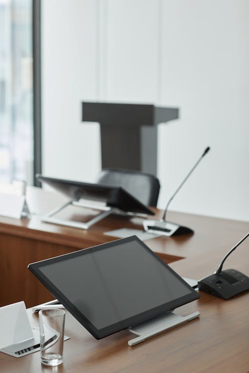 Black Digital Tablet On Wooden Table