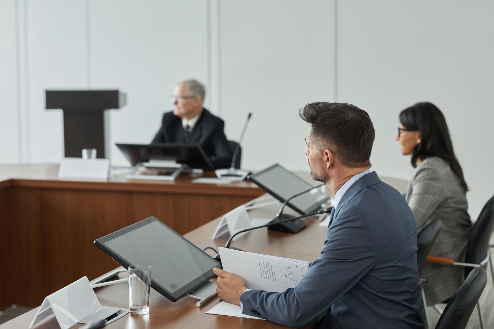 Professionals collaborating in a modern conference room