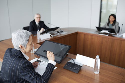 Businesspeople at Conference in Boardroom