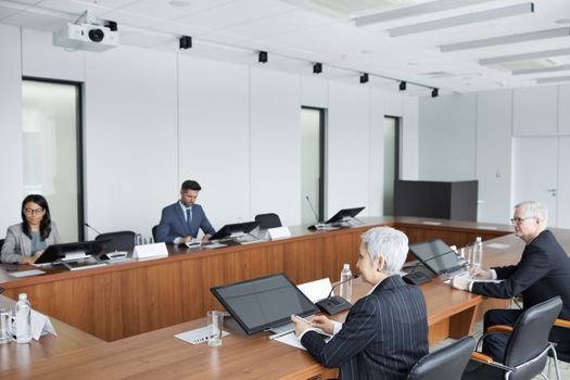 People Sitting at Conference Table