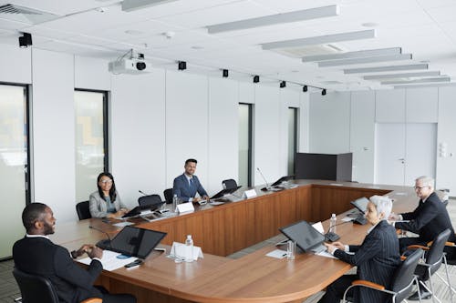 People Sitting at Conference Table