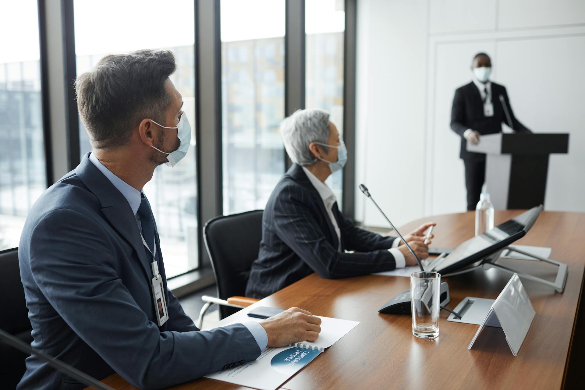 Businessmen in Black Suits Having a Board Meeting