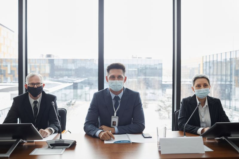 Dallas business leaders reviewing continuity plans in a conference room