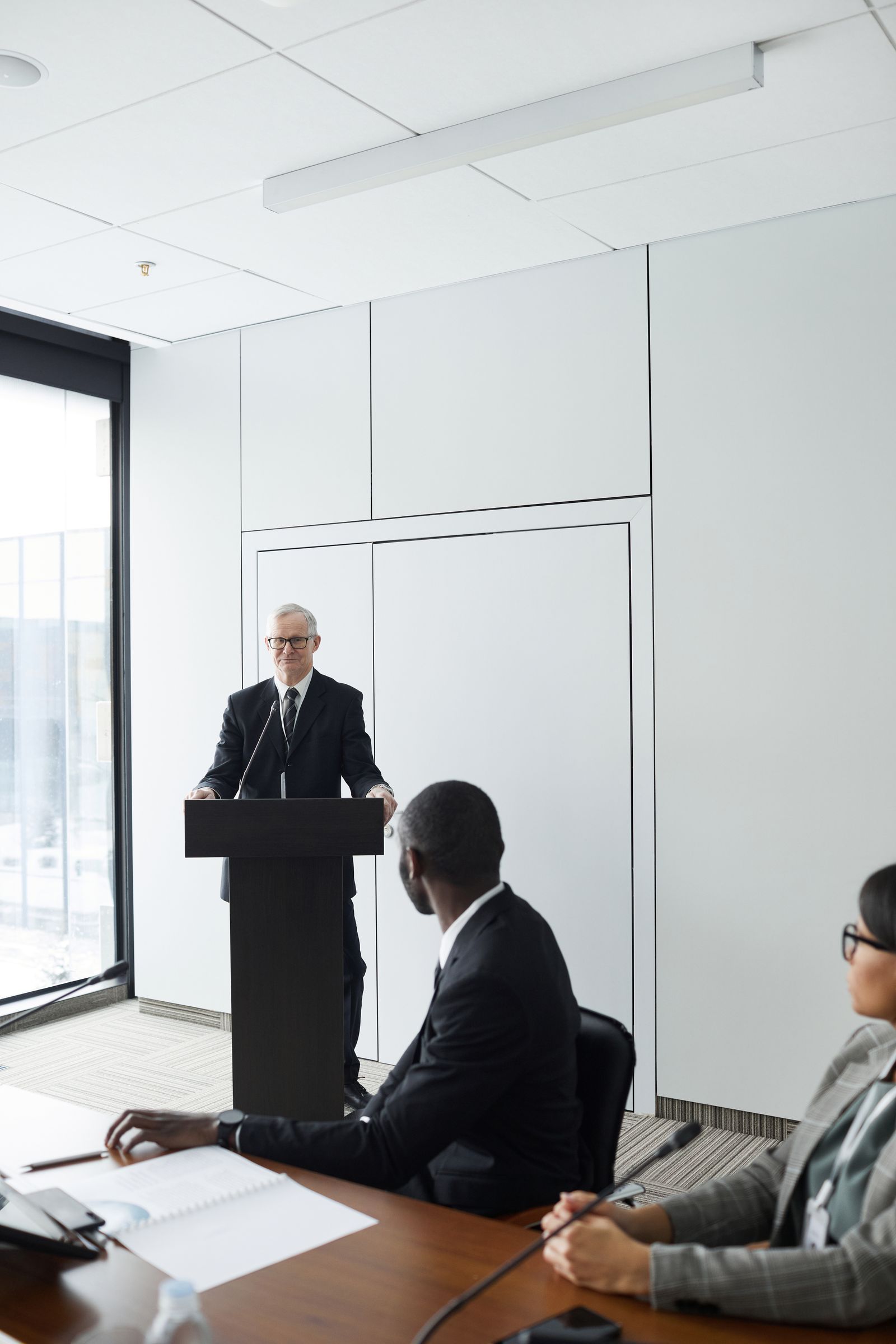 A business meeting in progress around a conference table