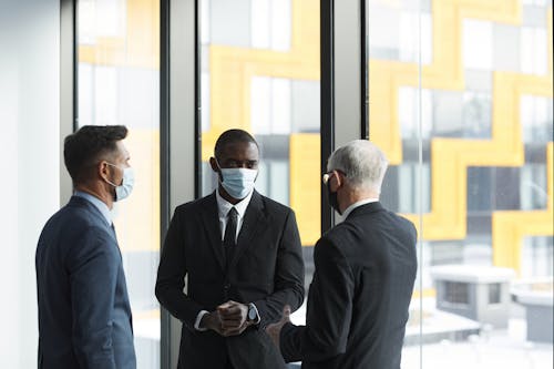 A Group of Men Wearing Face Masks
