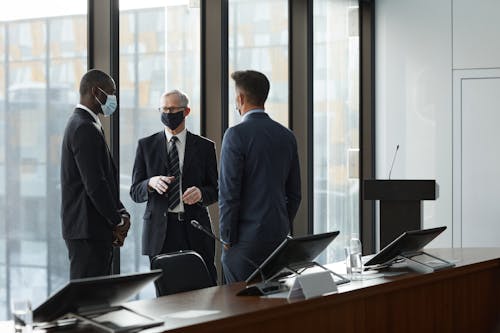 A Group of Men Wearing Face Masks
