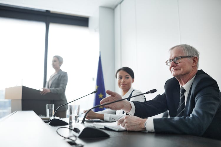 Man Speaking During An EU Conference