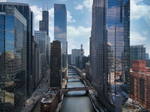 Free Stunning aerial view of Chicago's skyline showcasing modern high-rises and the Chicago River. Stock Photo