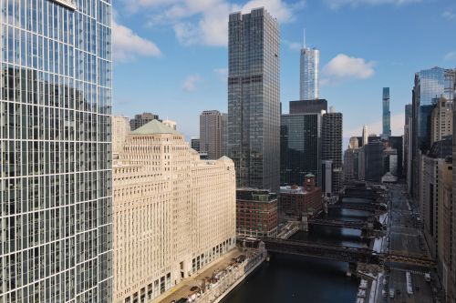Free Aerial view of Chicago skyline featuring the Chicago River and modern skyscrapers. Stock Photo