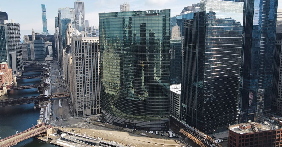 Stunning aerial view of downtown Chicago featuring iconic skyscrapers and the river.