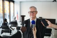 Man in Black Suit Wearing Eyeglasses