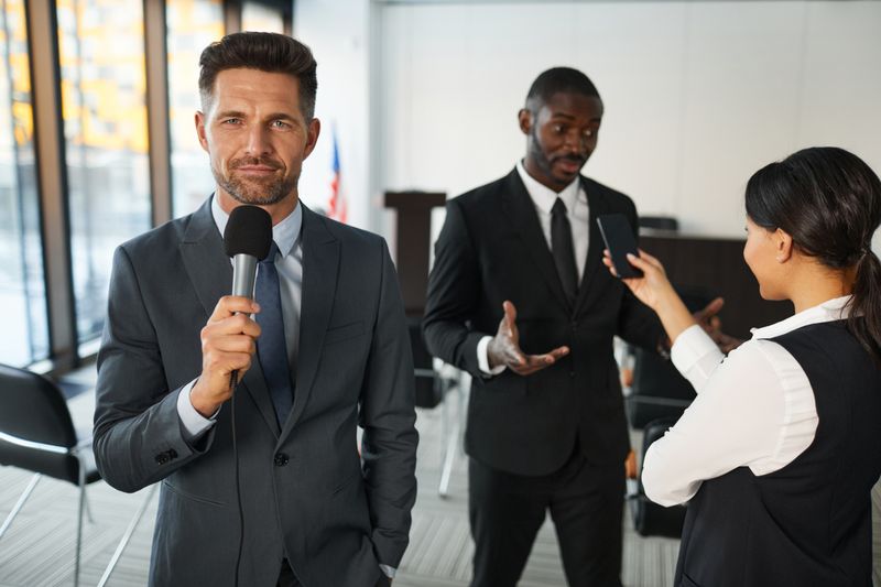 An executive being interviewed in a conference room — photo by Werner Pfennig on Pexels