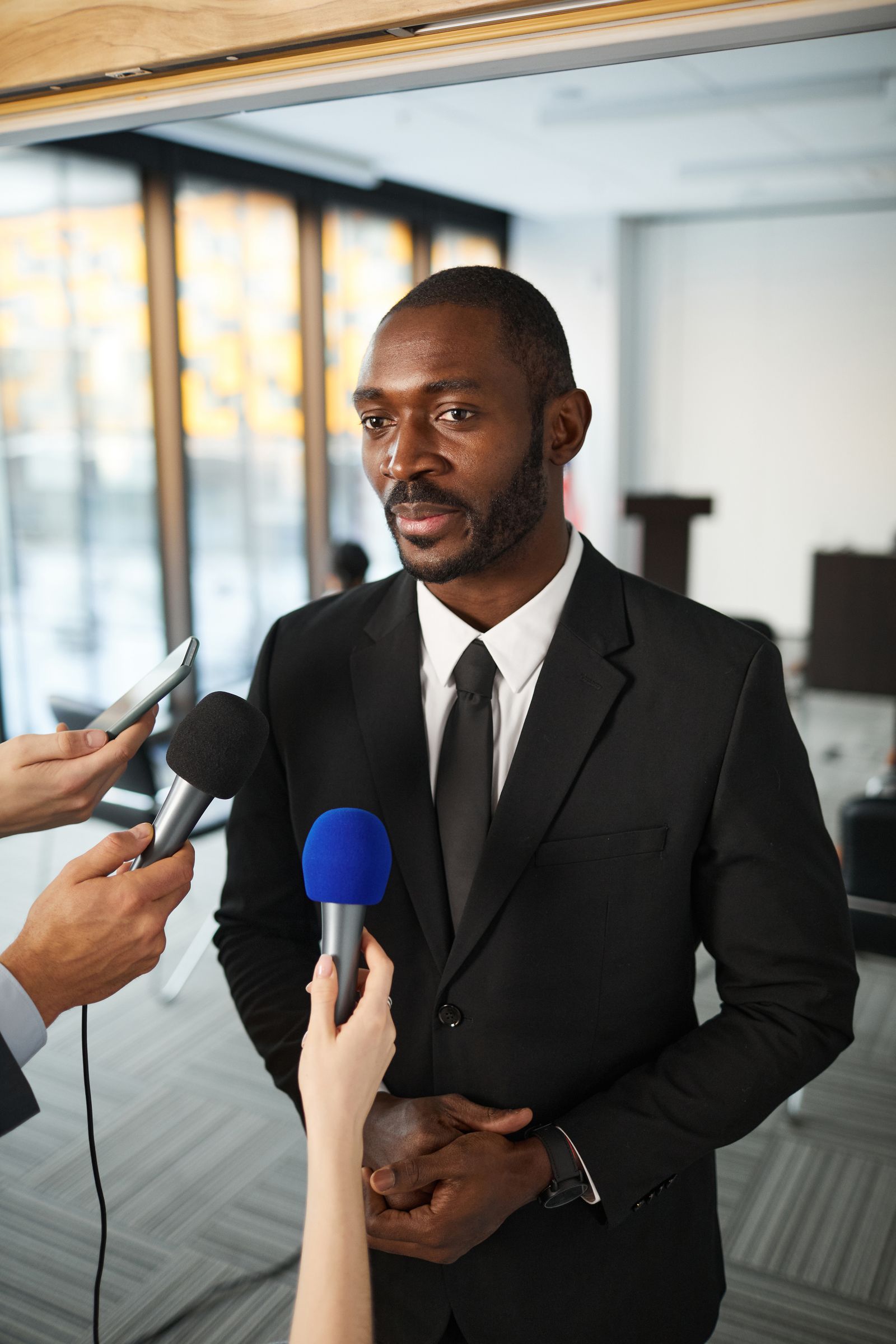 Executive answering questions from journalists
