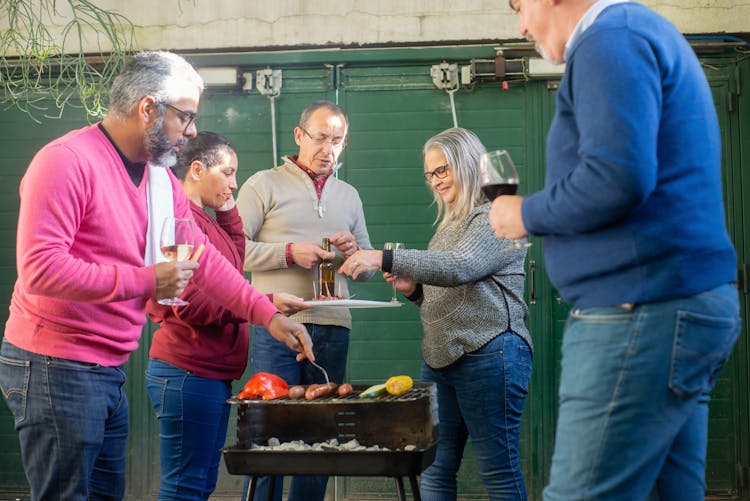 Family Around Barbecue