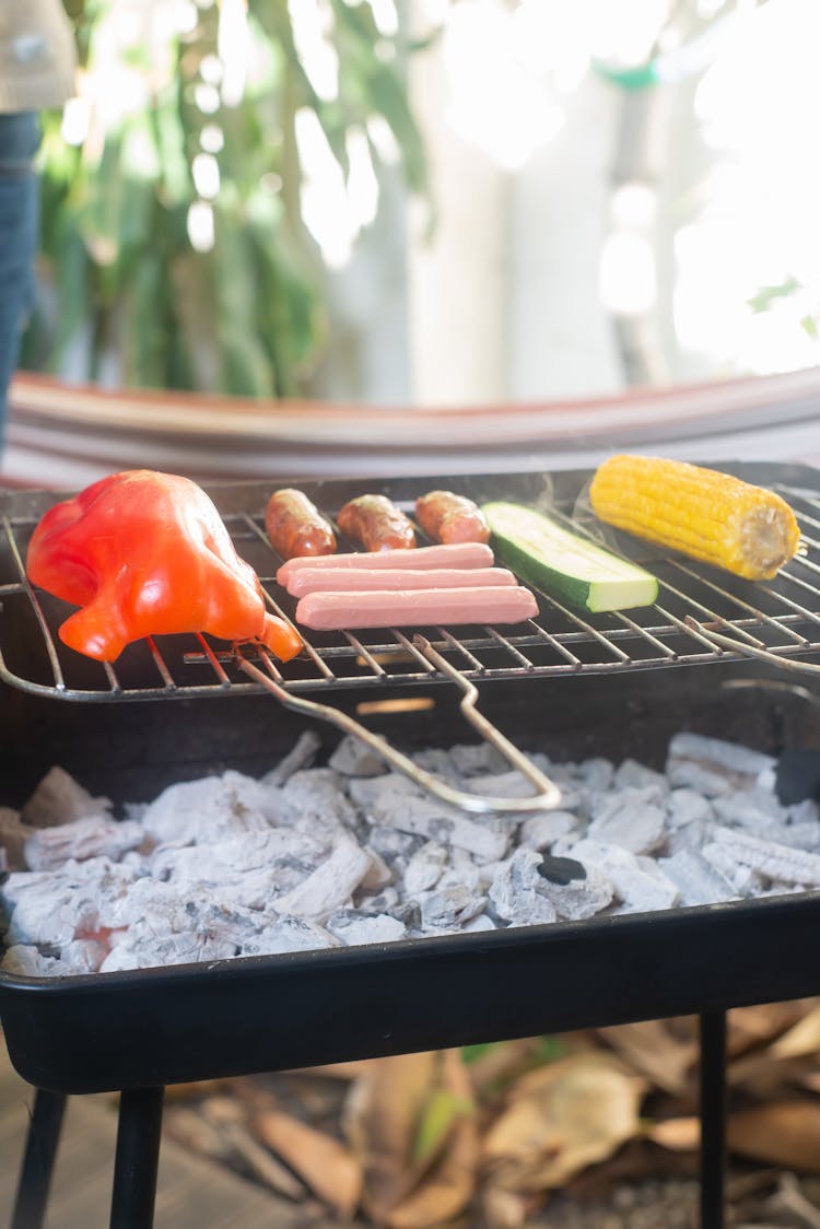 Corn, Meat And Vegetables On Barbecue