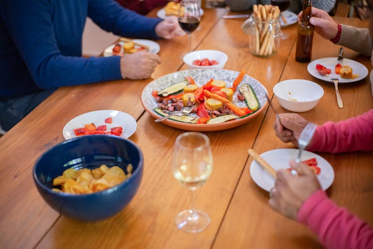 Group Of People Eating Together