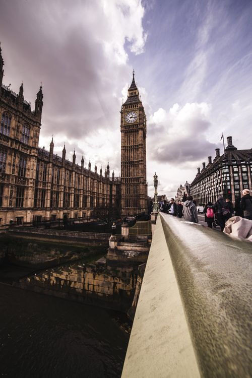 Free View from Westminster bridge to Big Ben clock tower and Houses of Parliament United Kingdom in London against cloudy sky on daytime Stock Photo