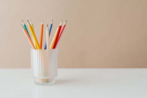 Free Colored Pencils on a Glass Stock Photo