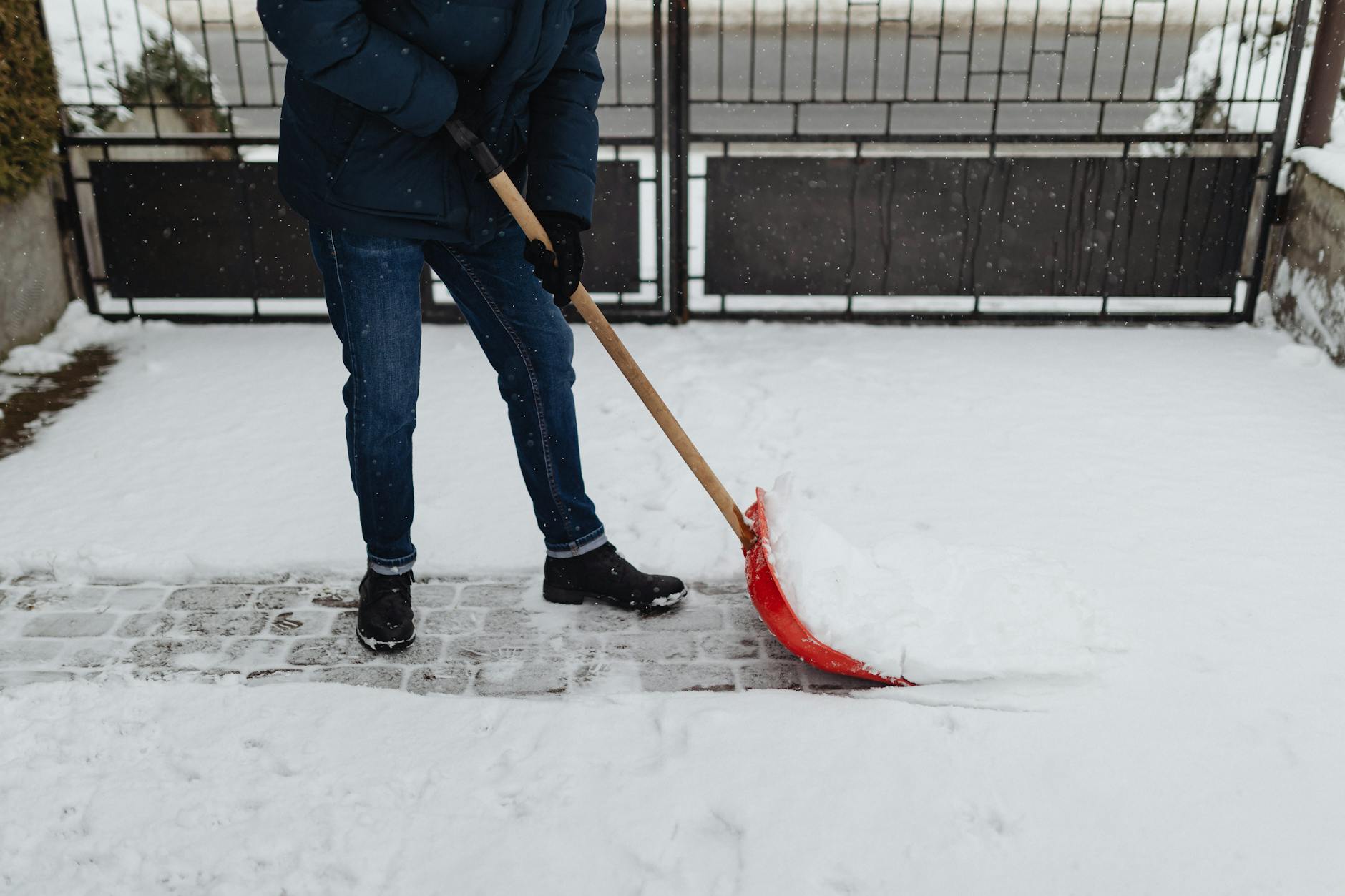 Person Wearing A Heavy Winter Coat At The Airport