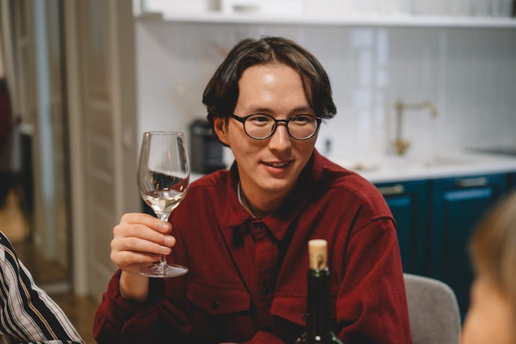 Man Holding A Wine Glass