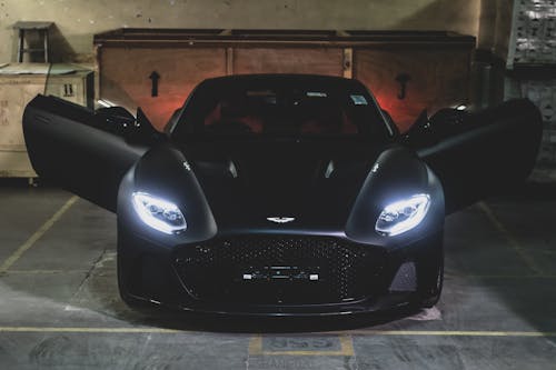 A Black Aston Martin in a Parking Lot