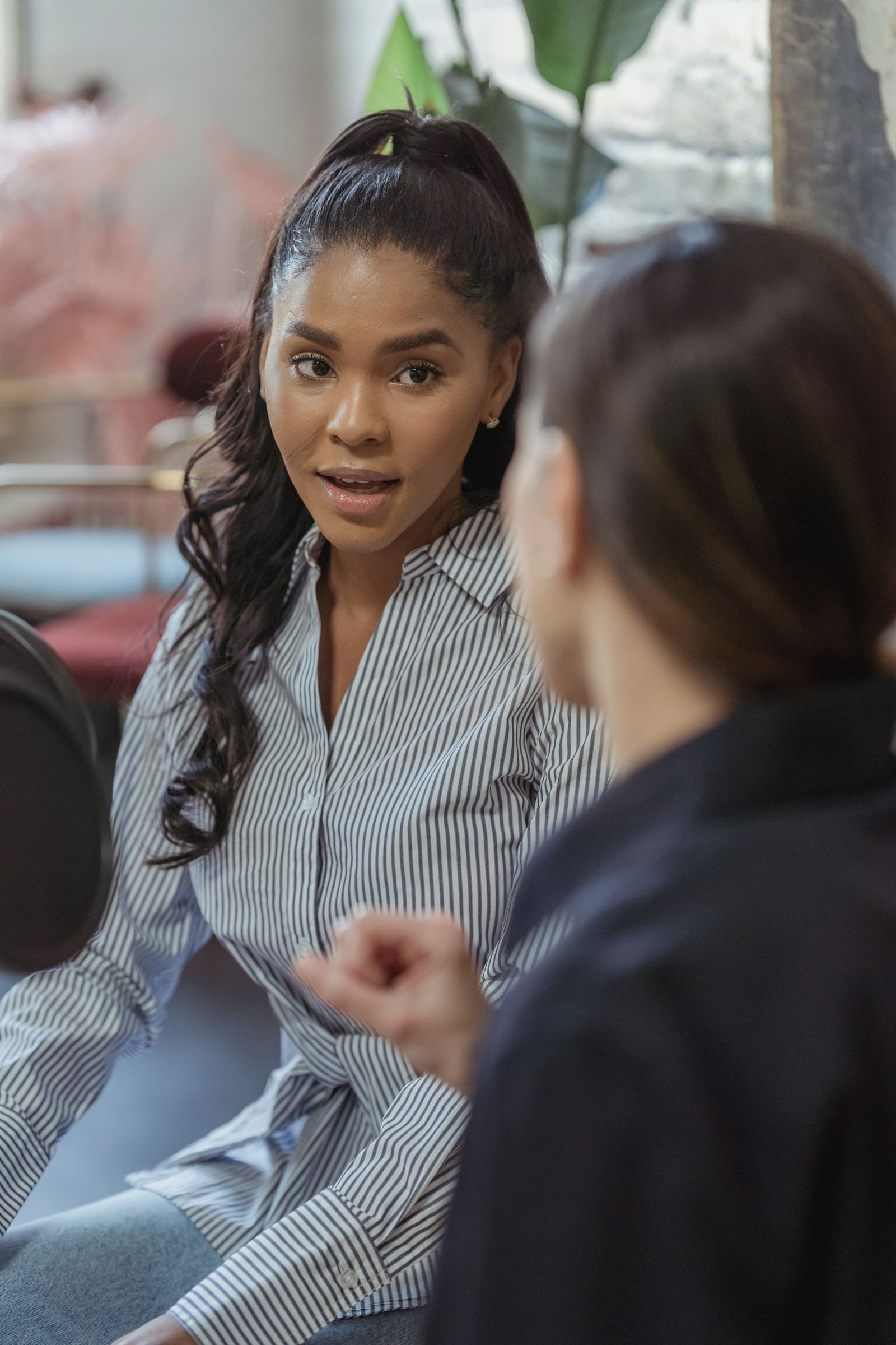 Compliance expert discussing business needs with a client