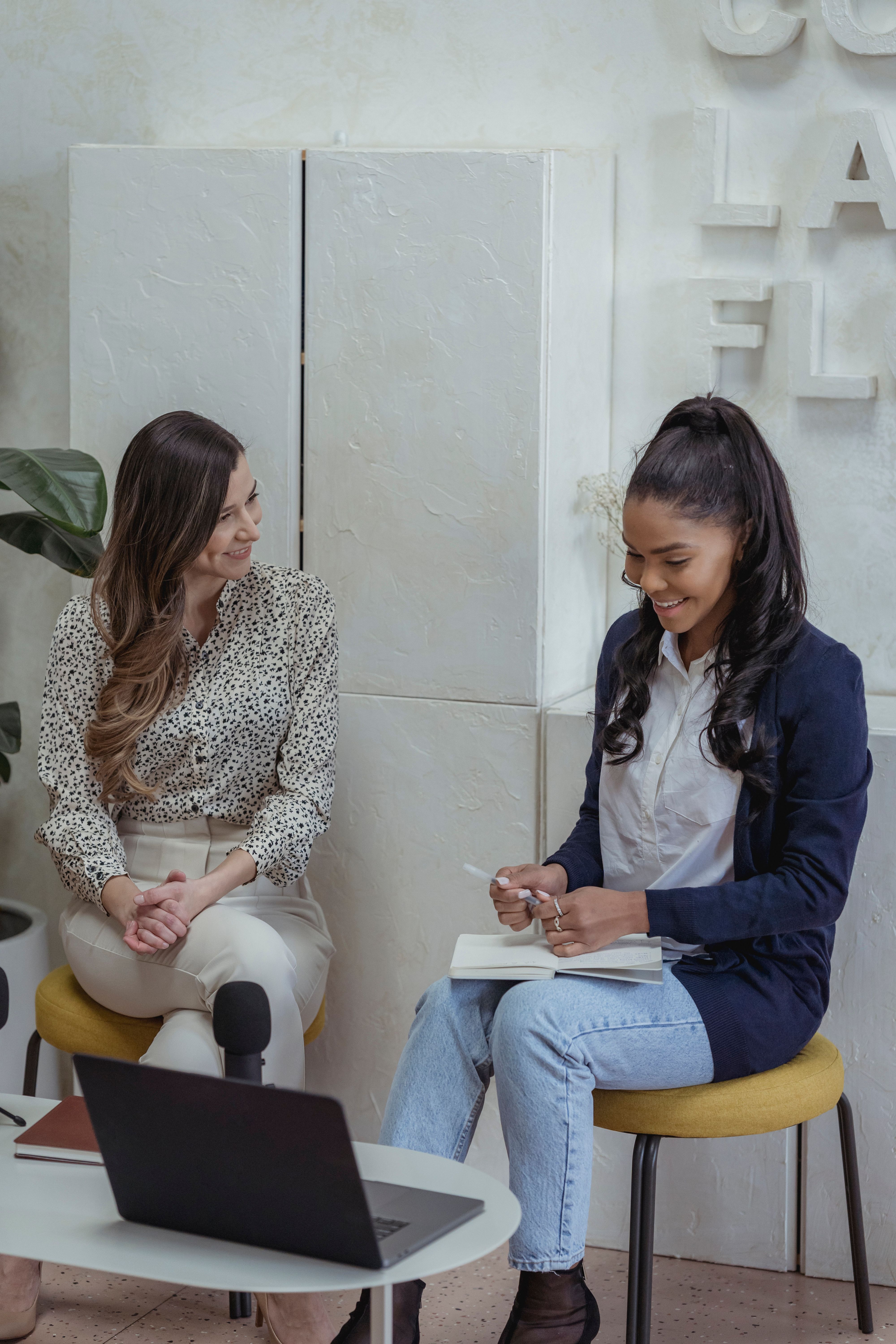 Two professionals having a customer discovery conversation