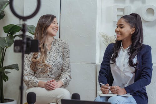 Smiling Women Talking during an Interview
