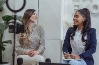 Two people recording an on-camera conversation — photo by George Milton on Pexels