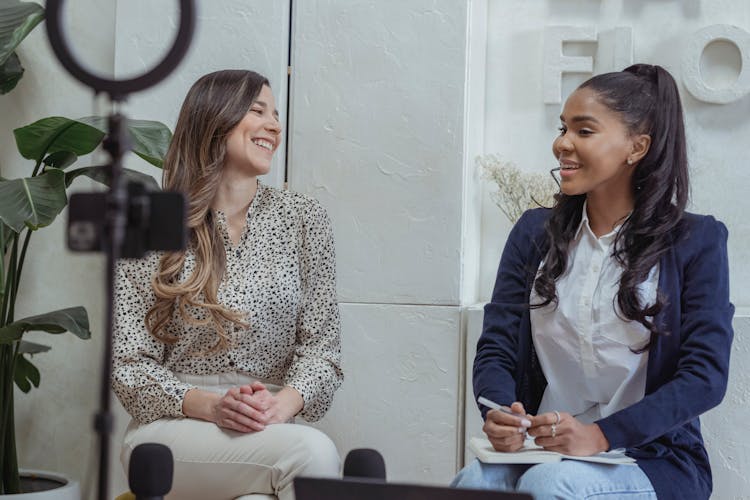 Smiling Women Talking During An Interview