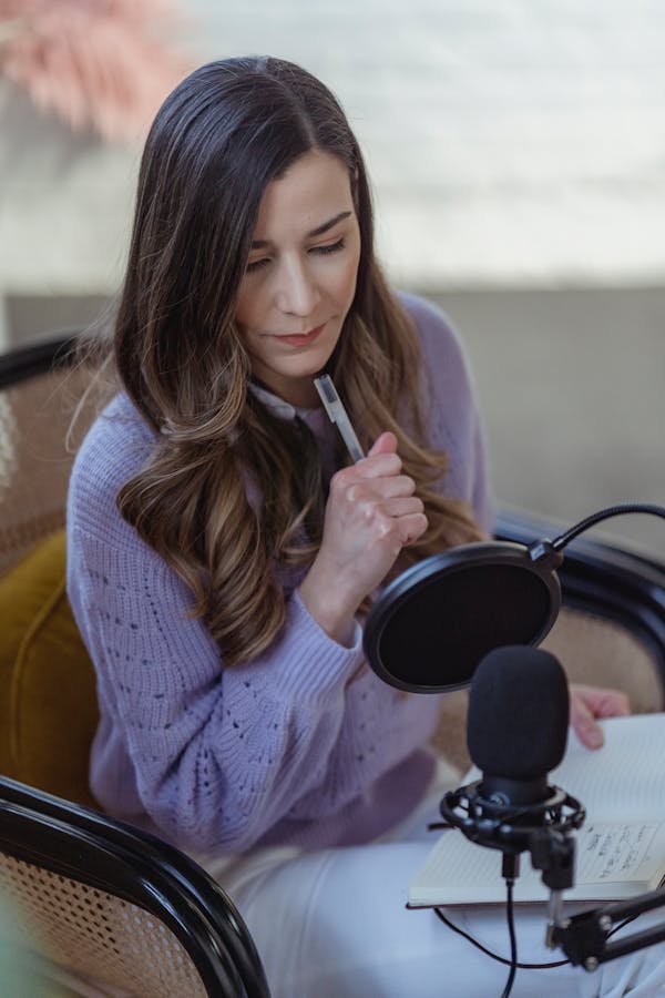 Woman recording podcast
