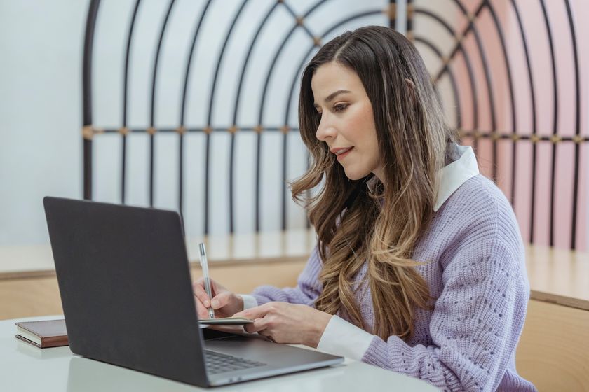 Course preview: a writer drafting notes beside a laptop — photo by George Milton on Pexels