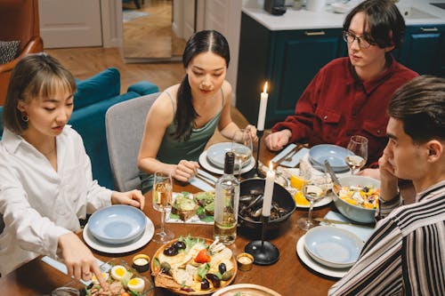 Free Group of Friends Eating Together  Stock Photo