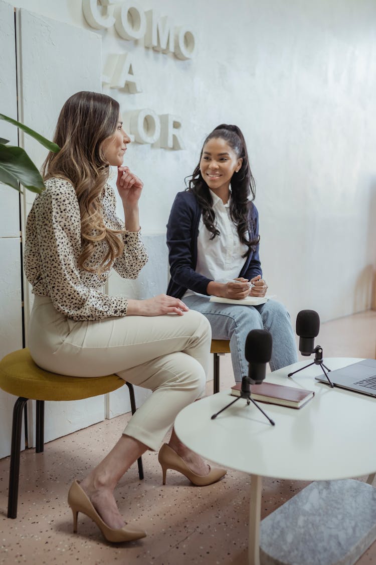 Cheerful Diverse Women Recording Podcast