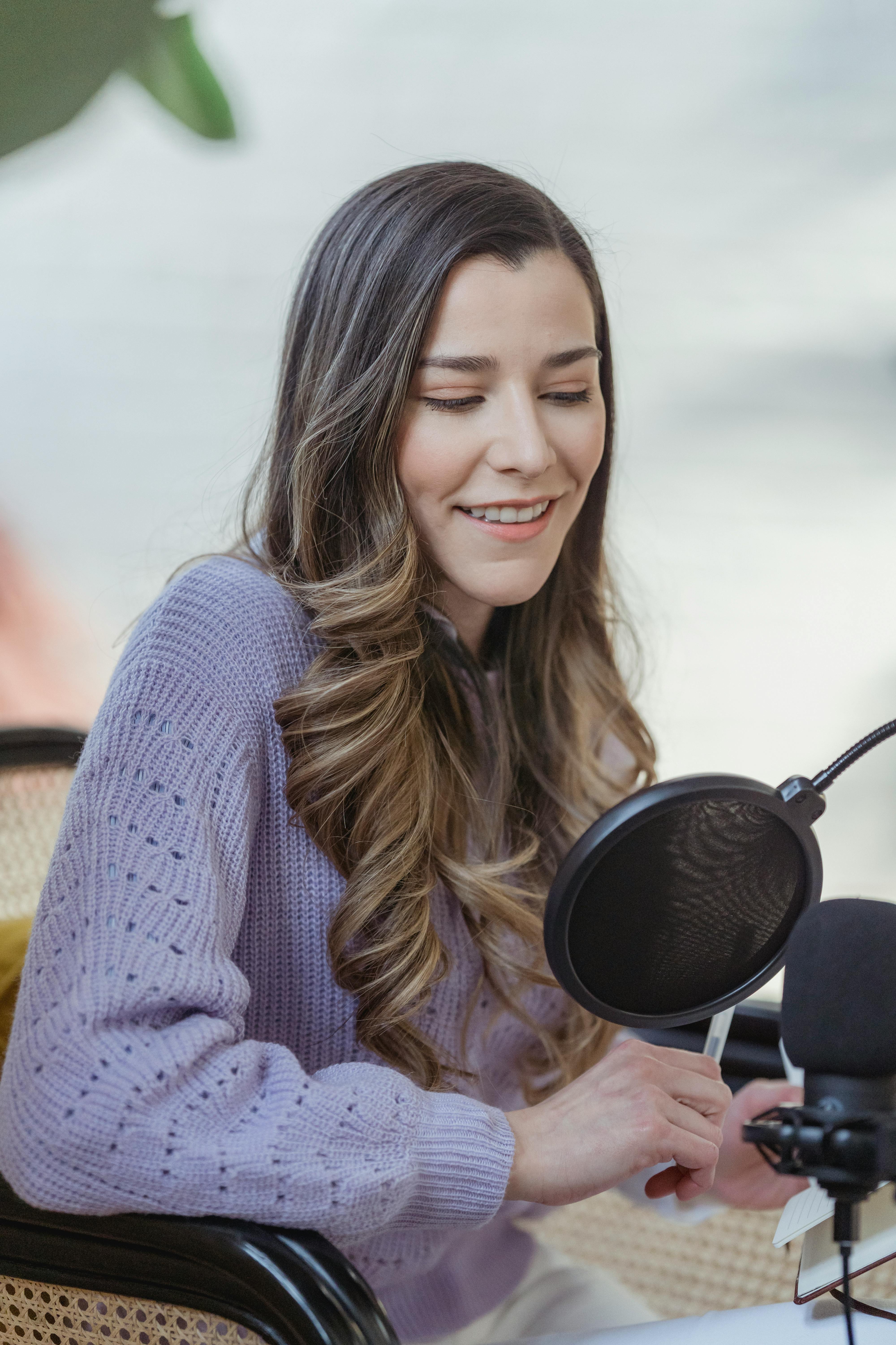 content woman recording voice message