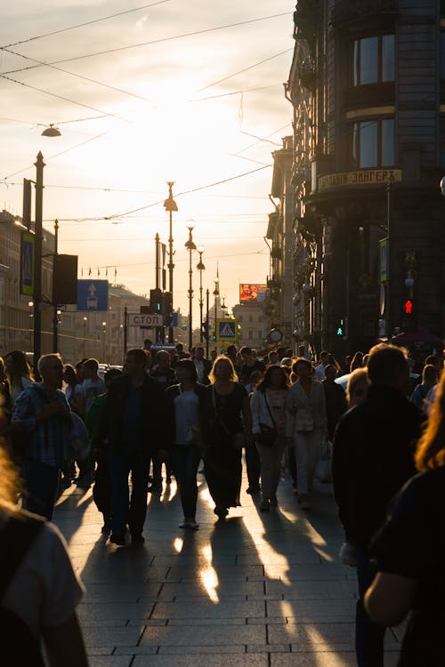 People Walking on the Busy Street 