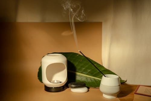 Free Lit Incense in a Ceramic Vase Stock Photo