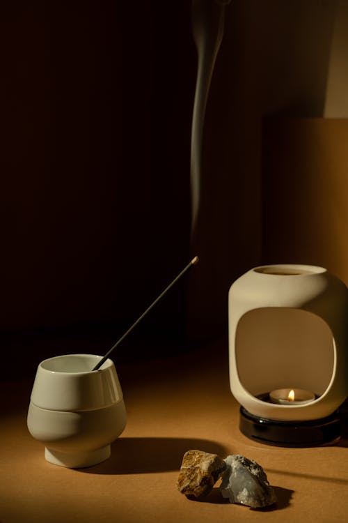 A Burning Incense in a Ceramic Vase