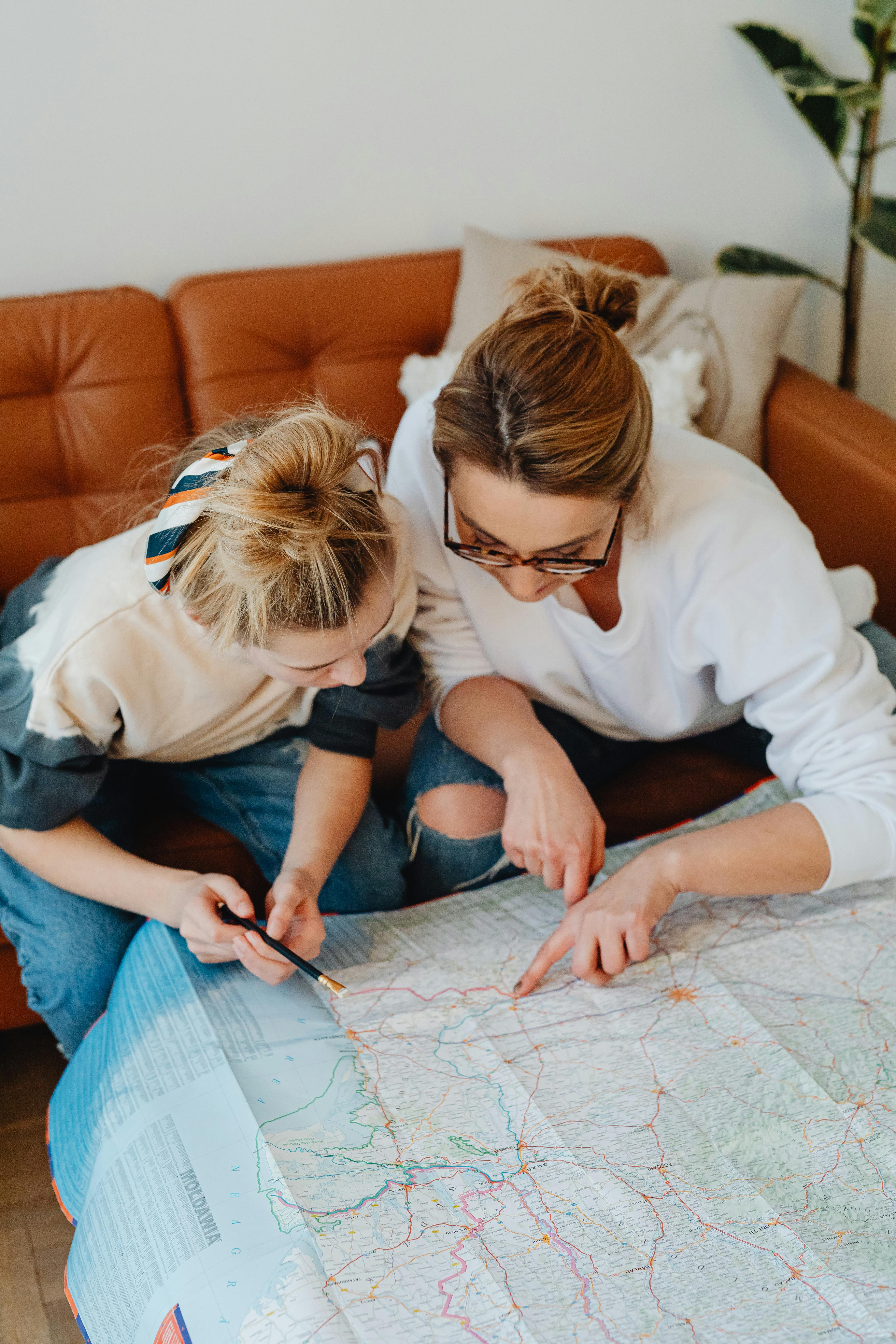 Digital travel map showing route lines and photos