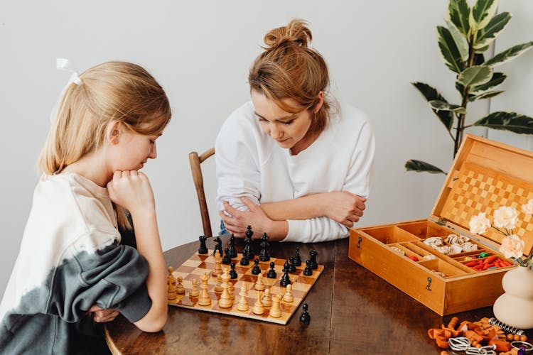 Photo Of People Playing Chess